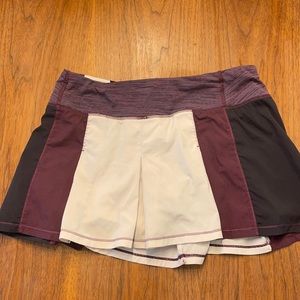 Lululemon burgundy, black and cream tennis skirt